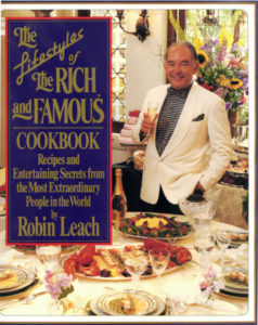 Cover of the book, The Lifestyles of the Rich and Famous Cookbook authored by Robin Leach, featuring recipes by Wolfgang Puck